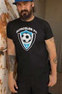 Man wearing a hat and an example of a custom-printed t-shirt.
