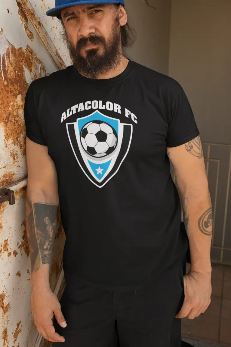 Man wearing a hat and an example of a custom-printed t-shirt.